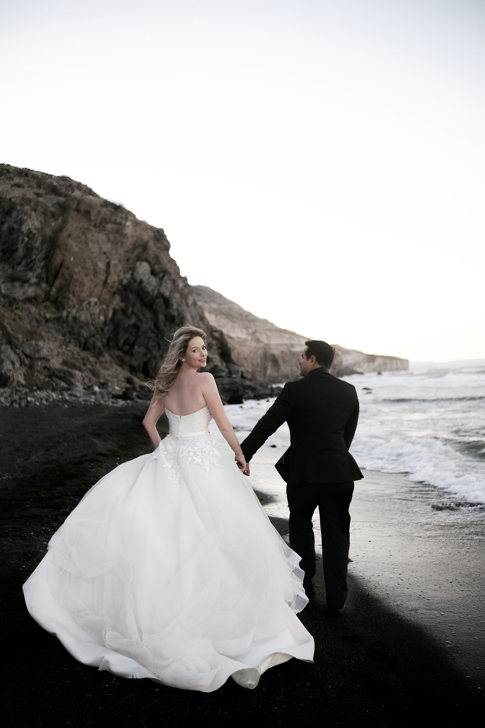 Bride and groom on the coast